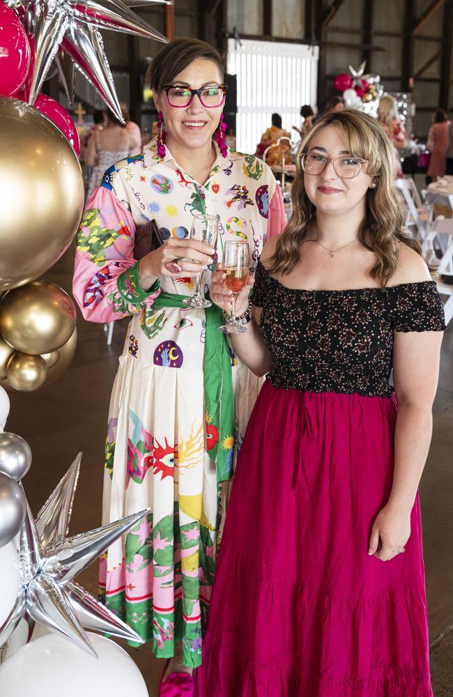 Josie Griffiths (left) and Jasmin Bower at the Pink High Tea fundraiser for Toowoomba Hospital Foundation at The Goods Shed, Saturday, October 12, 2024. Picture: Kevin Farmer