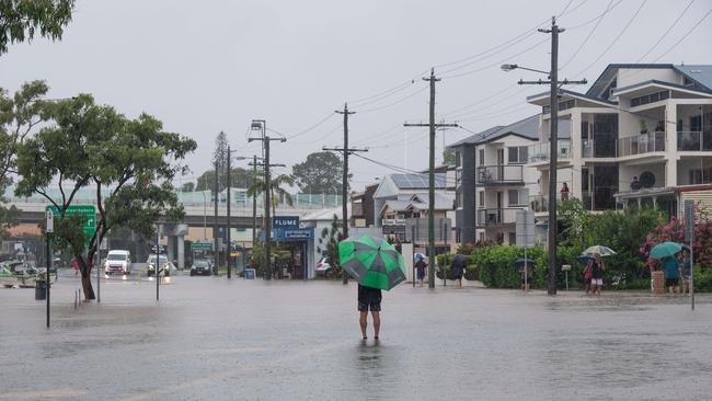 Maroochy River breaks its banks along Bradman Ave, Maroochydore on Saturday. Picture: Brad Fleet