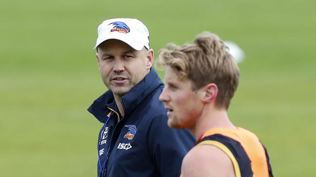 Crows coach Matthew Nicks talks to his captain Rory Sloane. Picture: Sarah Reed.