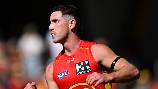 GOLD COAST, AUSTRALIA - AUGUST 17: Sam Flanders of the Suns celebrates kicking a goal during the round 23 AFL match between Gold Coast Suns and Melbourne Demons at People First Stadium, on August 17, 2024, in Gold Coast, Australia. (Photo by Albert Perez/AFL Photos via Getty Images)