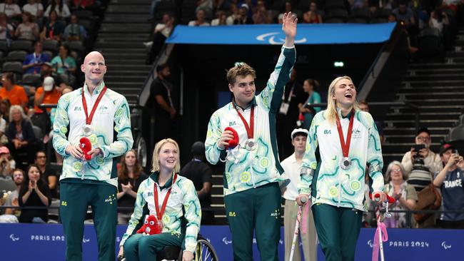 Silver medallists (right to left) Alexa Leary, Callum Simpson, Chloe Osborn and Rowan Crothers of Team Australia pose for a photo during the Mixed 4x100m Freestyle Relay. Picture: Sean M. Haffey/Getty Images.