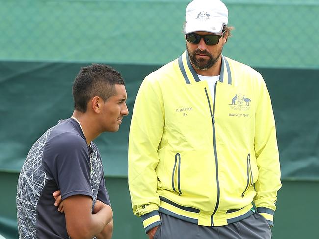 Pat Rafter talks with Nick Kyrgios during the Davis Cup practice session late last year.