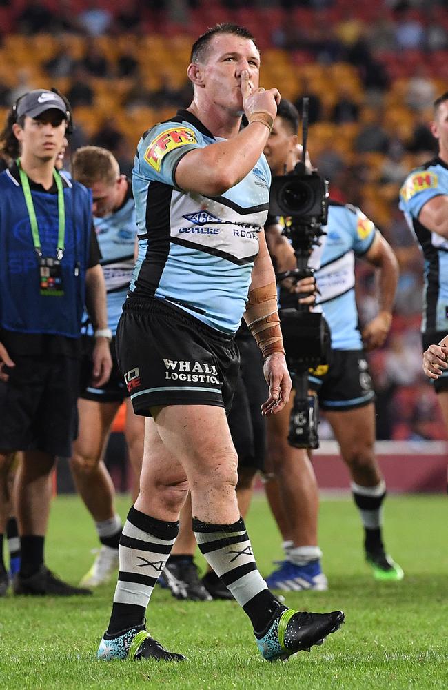 Paul Gallen silences the Suncorp Stadium crowd after kicking a conversion. Picture: AAP Image/Dave Hunt