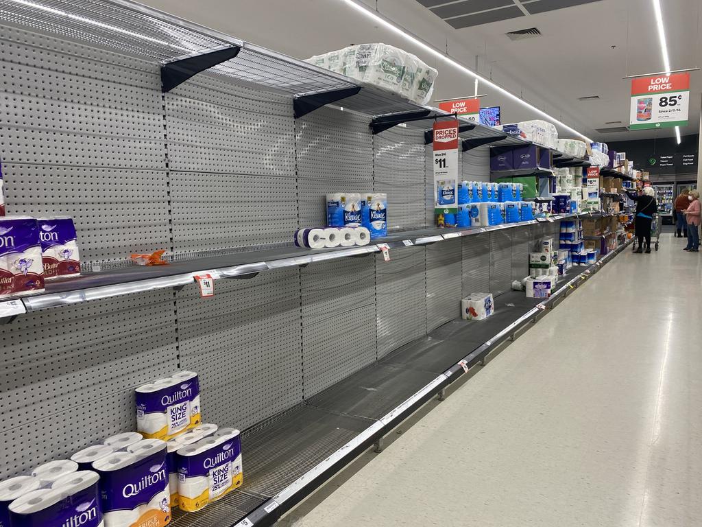 Panic buyers stripped shelves at supermarkets ahead of the lockdown.