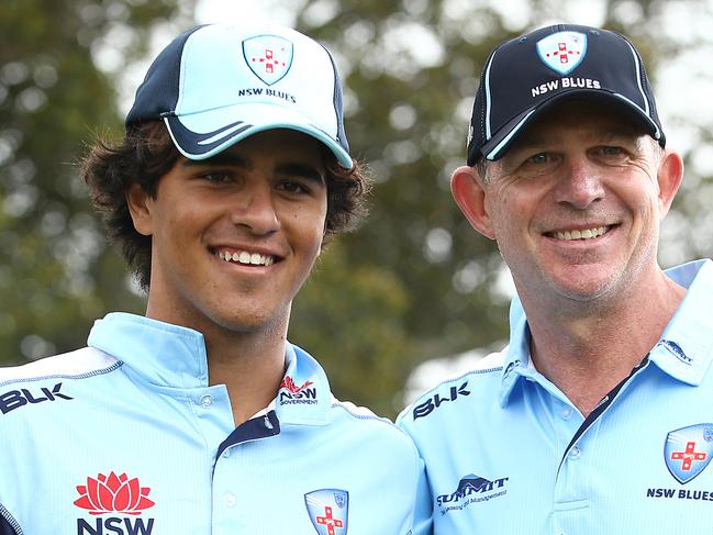 SYDNEY, AUSTRALIA - FEBRUARY 15: Oliver Davies of the Blues is presented his Blues team cap by Shawn Bradstreet during the Marsh One Day Cup match between New South Wales and Victoria at North Sydney Oval on February 15, 2021 in Sydney, Australia. (Photo by Jason McCawley/Getty Images)