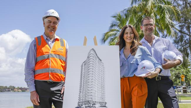 Liam and Yvette Hardy and McNab Senior Development Manager Mark Spedding are involved in a new tower planned for the corner of Birt and Oak Aves in Budds Beach. Picture: BEDROC