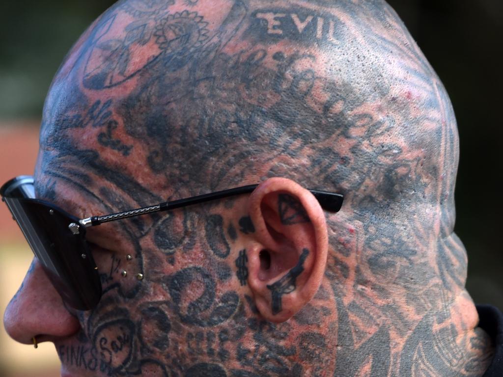 The heavily-tattooed Finks boss has the word “Evil” inked on his skull. Picture: Nicole Garmston