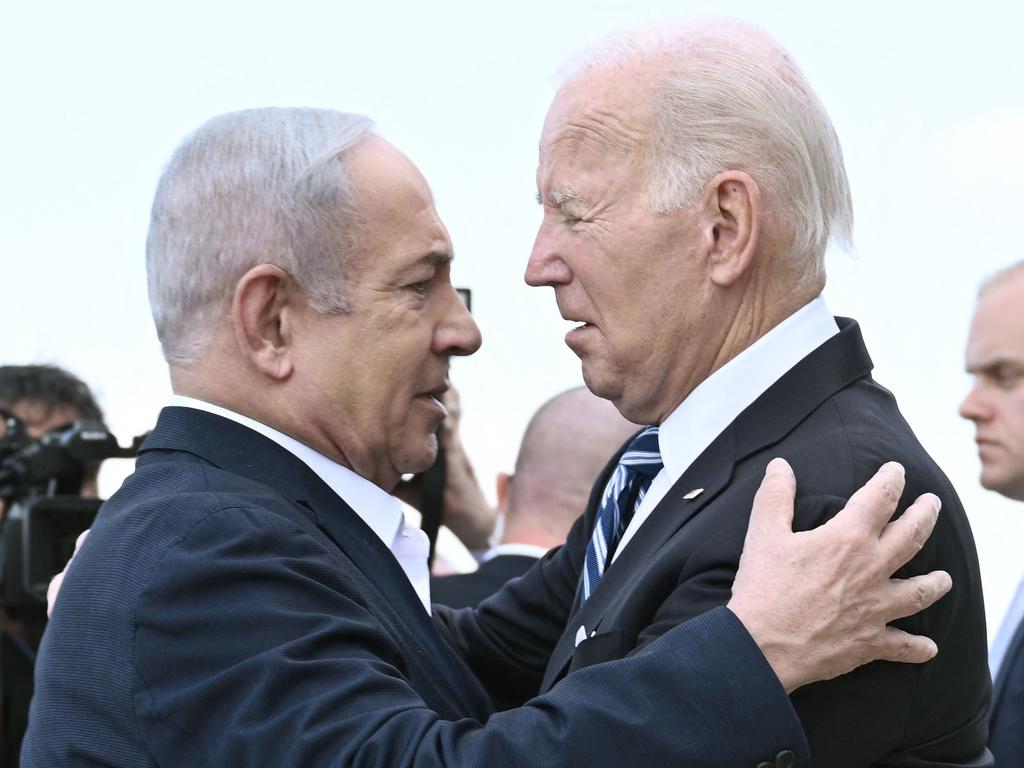 Israel Prime Minister Benjamin Netanyahu greets US President Joe Biden upon his arrival at Tel Aviv's Ben Gurion airport. Picture: Brendan AFP