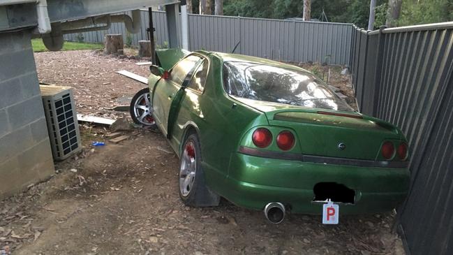 Emergency services were called to Bellbird Dr, Malua Bay, about 2am on Friday after reports a Nissan Skyline car had spun off the road, before crashing into the two-storey home. Picture: Supplied