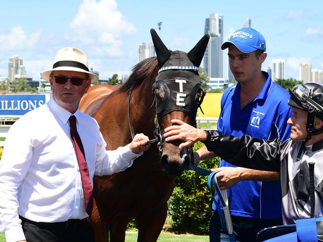 new Magic Millions favourite HOUTZEN (ridden by Jeff Lloyd). L-R Trainer Tony Edmonds, Houtzen, Trend Edmonds, Jeff Lloyd Photo: Grant Peters, Trackside Photography