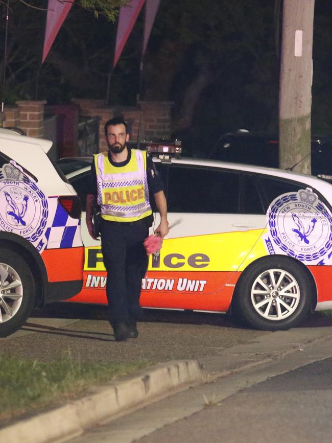 Crash investigators on their way to inspect a vehicle after the Oatlands fatalities. Picture: Steve Tyson