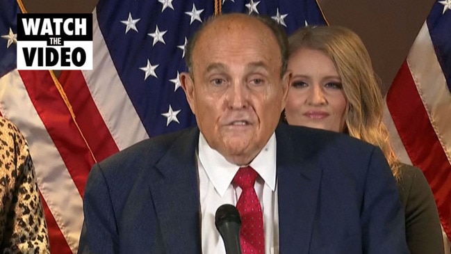 Moment Rudy Giuliani’s hair dye runs down his face during press conference