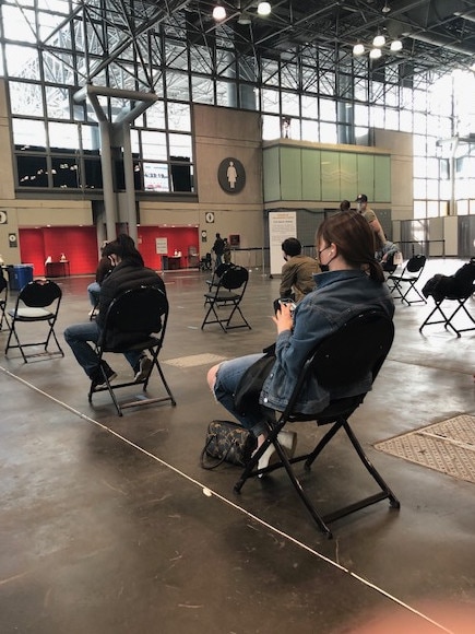 People wait their turn at the Javits Centre in Manhattan. Picture: Supplied