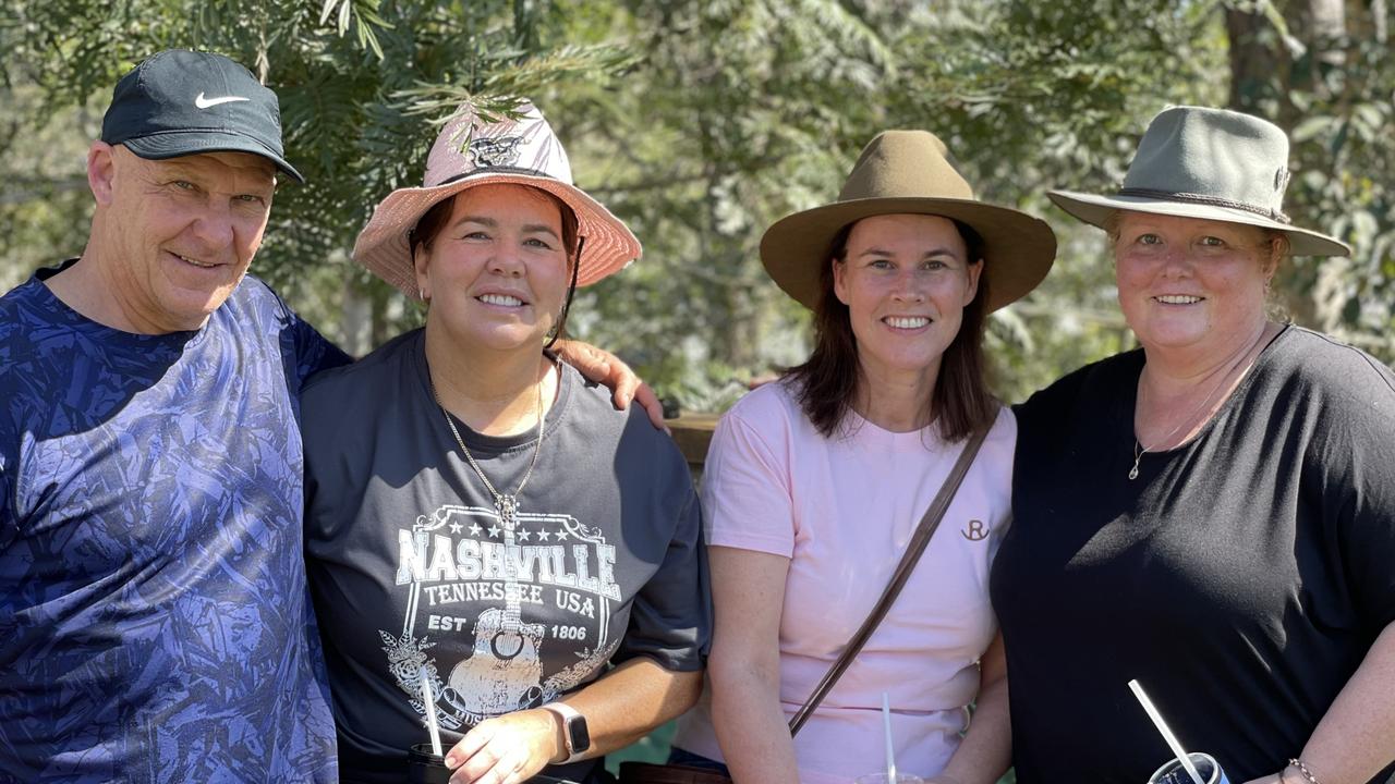 Richard Turberville, Stephanie Keys, Mikarla Wallace and Tracey Clements, from Brisbane, enjoy day one of the 2024 Gympie Muster, at the Amamoor State Forest on August 22, 2024.