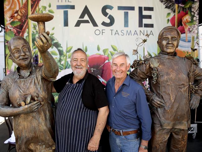 John Caire, of Festival Tempura Mushrooms, left, has been involved with the Taste since its first event and, along with Fred Peacock, of Bream Creek Vineyard, has been honoured with a statue at the event site.