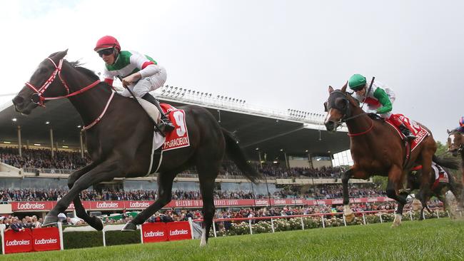 Lys Gracieux dashes clear of Castelvecchio to win the Cox Plate. Picture: Micheal Klein