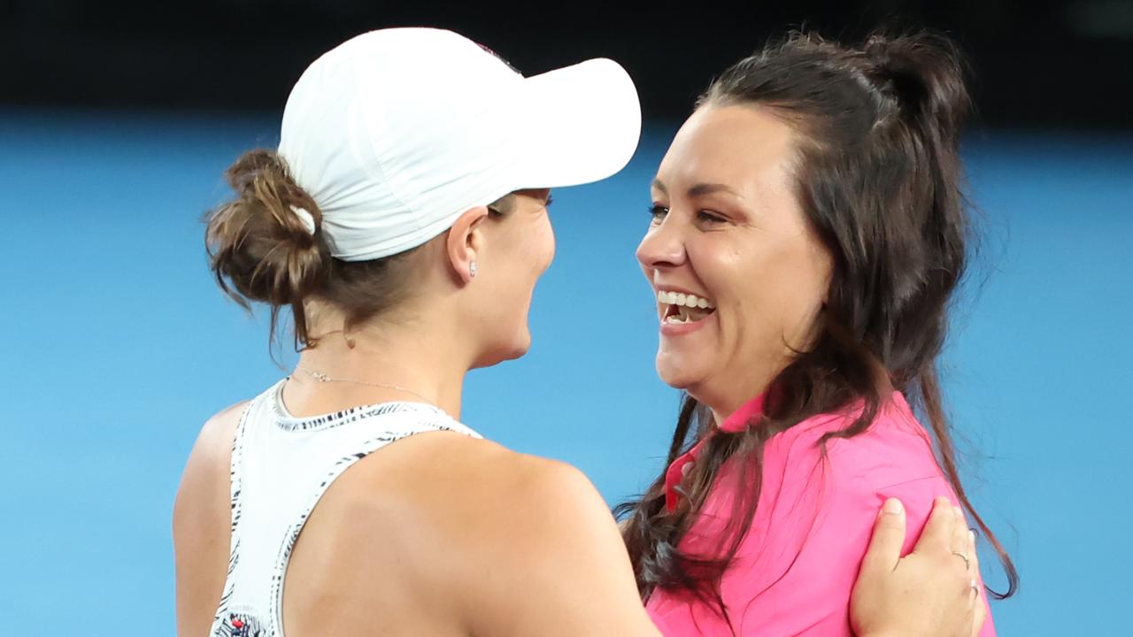 Barty celebrates with Casey Dellacqua after winning the women's final. Picture: David Caird