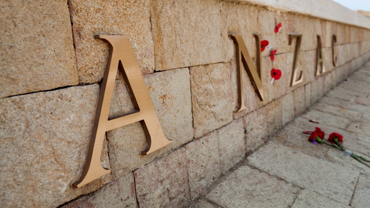 Australians pause to honour veterans at dawn services around the nation