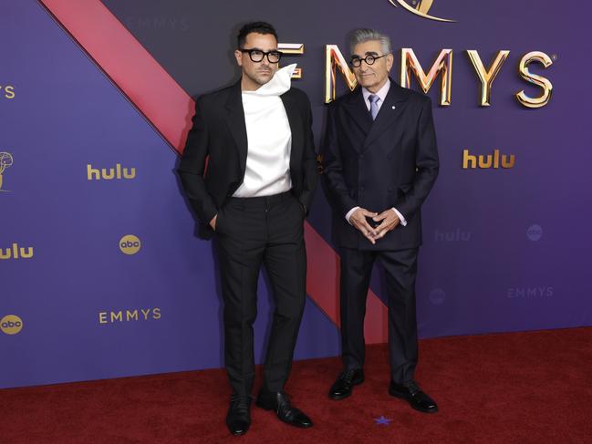 Dan Levy and dad Eugene Levy hit the Emmys red carpet before their hosting duties. Picture: Getty Images