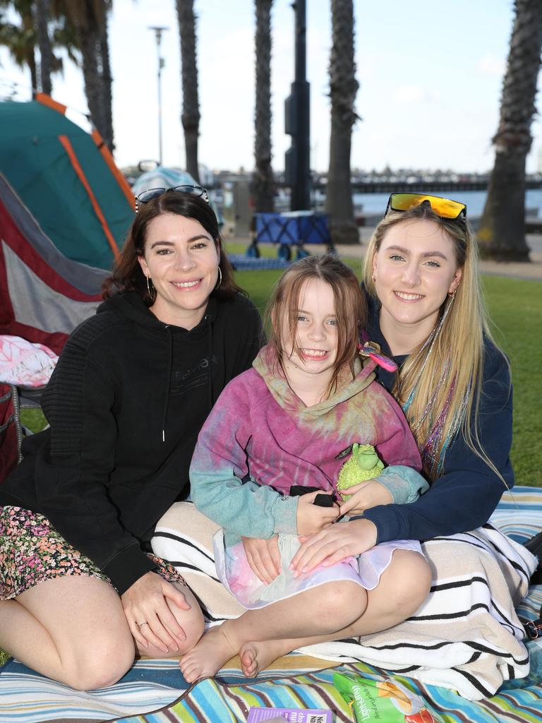 Sam and Sage McVilley and Charlotte Hayler. Locals and visitors arrived early to get a good spot for the Geelong New Years Eve celebrations. Picture: Alan Barber