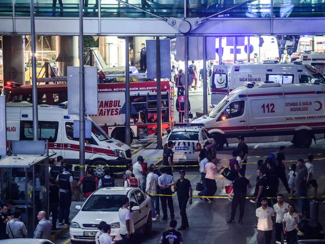 Chaotic scenes outside Istanbul’s international airport as forensic police attend to the explosion site. Picture: AFP