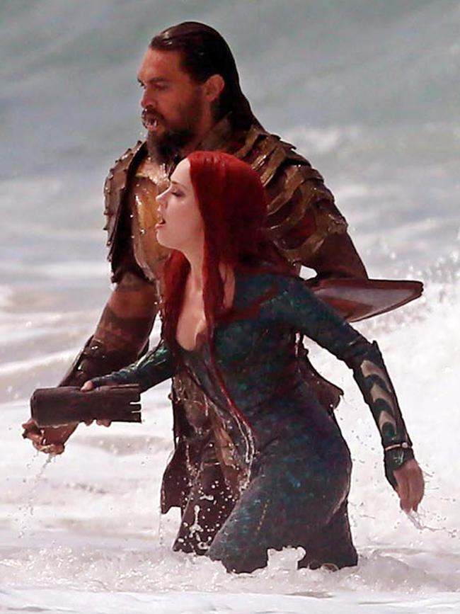 Jason Momoa and Amber Heard in Aquaman