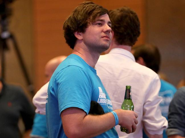 WEEKEND TELEGRAPH, MARCH 25, 2022: People pictured watching the screens at the Liberal Election Party at the Hilton Hotel, Sydney CBD. Picture: Damian Shaw