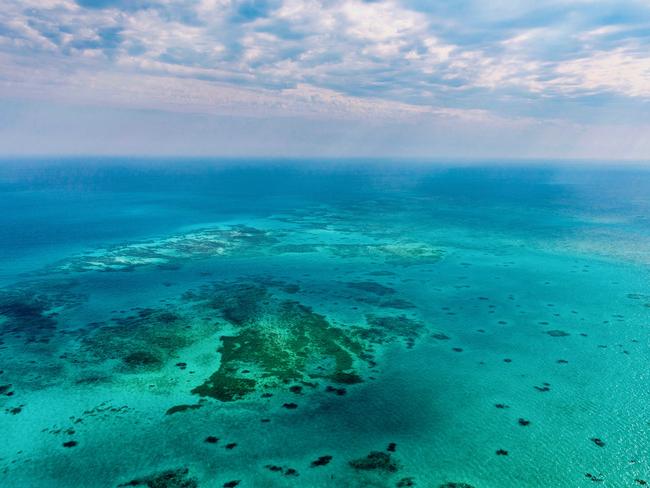 DON'T USE BEFORE JUNE 26 Holiday in Queensland Great Barrier Reef aerial   - photo Supplied MUST Credit  TTNQ