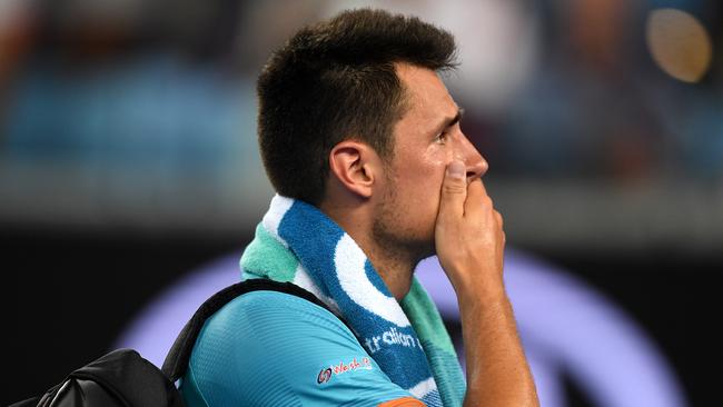 Bernard Tomic of Australia reacts while leaving the court after being defeated by Marin Cilic of Croatia. Picture: AAP