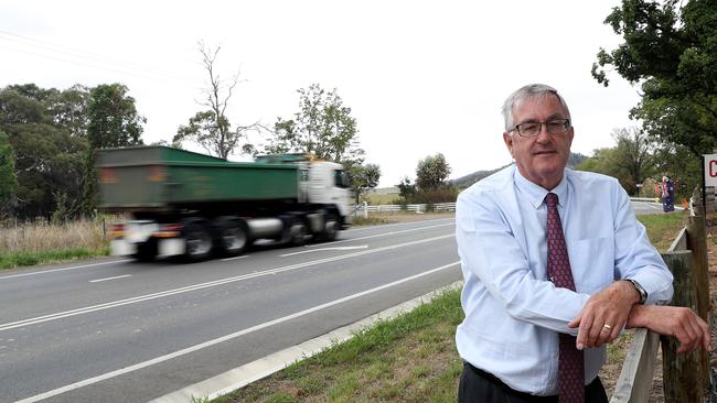 Transport Minister Rene Hidding announces an election promise to widen and improve the road between Richmond and Cambridge. Picture: LUKE BOWDEN