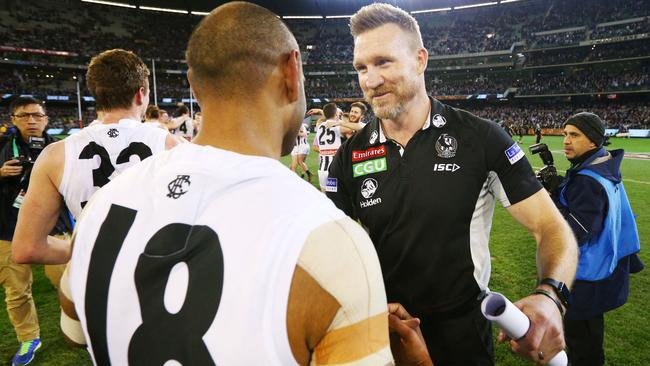 Travis Varcoe and Nathan Buckley celebrate the preliminary final win.