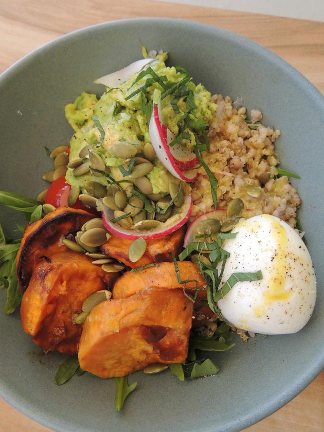 ’Gym Junkie’, inspired by F45 Training Castle Hill, is a deliciously healthy breakfast of egg, avocado, roasted maple sweet potato, grains, seeds, sprouts and tomato chutney ($12).