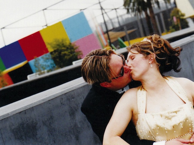 Carl and Roberta Williams kiss on their wedding day.