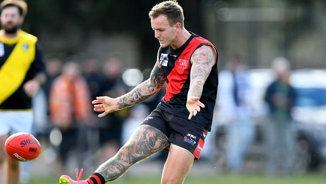 Bryce Williamson gets a kick for Riddell. Picture: Josh Chadwick