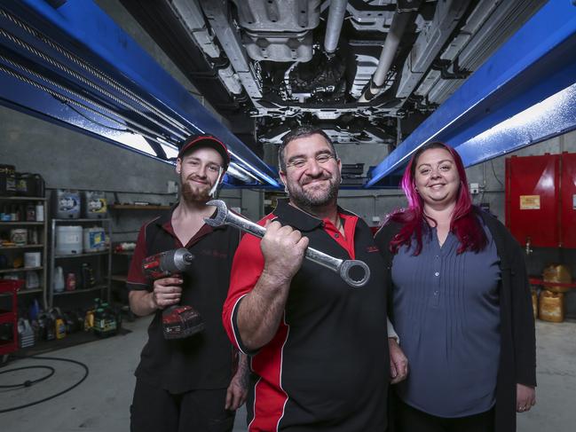 Number 7: Apprentice Eric Lincoln, Adrian Amato and wife Michelle of Amato Automotive, Seaford. Picture: Wayne Taylor