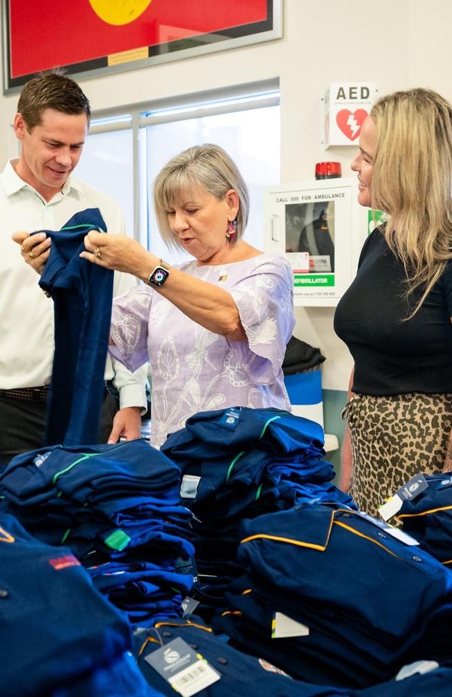 Principal of Darwin Middle School, Ben McCasker (left), Minister for Education and Training Jo Hersey (middle) and Department of Education and training rep Sandy Evans for the Back To School vouchers.