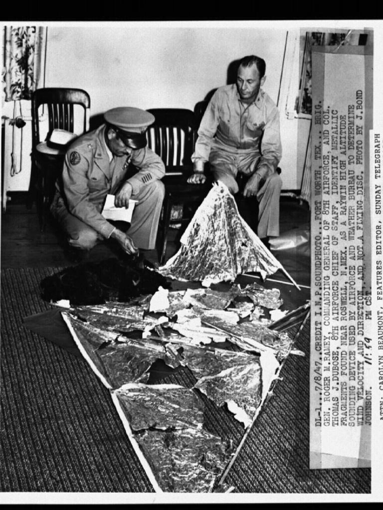 General Roger M Ramey & Colonel Thomas J Dubose from US Eighth Airforce identify metallic fragments found near Roswell, New Mexico, as Raywin high altitude sounding device used by airforce & weather bureau not flying disc. 07/08/47. Pic INP Soundphoto. General Historical Unidentified Flying Objects (UFO's)