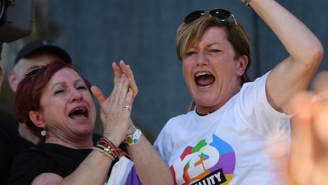 Christine Forster, the sister of former Prime Minister Tony Abbott, celebrates after watching the same sex marriage vote result announcement during a picnic held by the Equality Campaign at Prince Regent Park in Sydney, Wednesday, November 15, 2017. Australians have given same-sex marriage their approval with a 61.6 per cent 'yes' vote in a voluntary survey. (AAP Image/David Moir) NO ARCHIVING