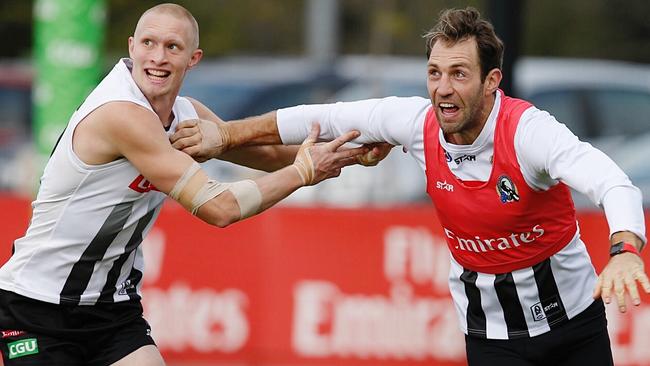 Jack Frost working with Travis Cloke at Collingwood training this year. Picture: Michael Klein