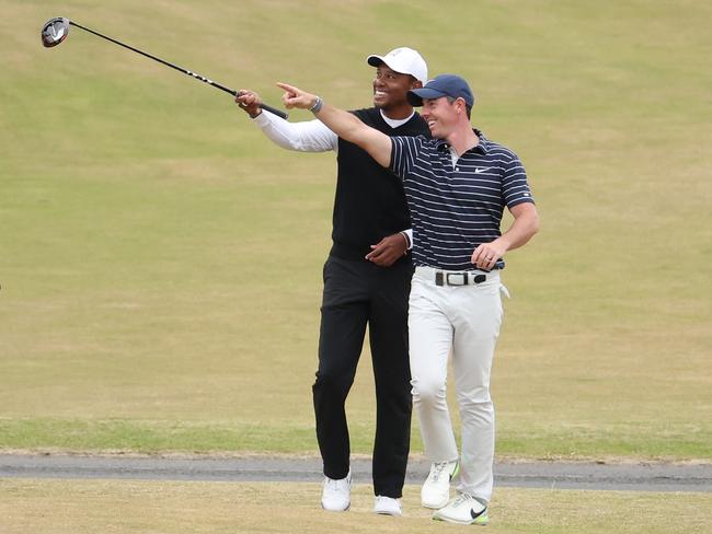 Tiger Woods and Rory McIlroy have a laugh at St Andrews. Picture: Getty Images