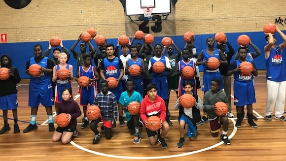 The Savannah Pride program with the balls from the Ben Simmons camp