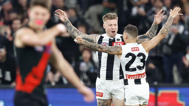 Jordan De Goey celebrates the opening goal of the game on Friday night. Picture: Michael Willson/AFL Photos