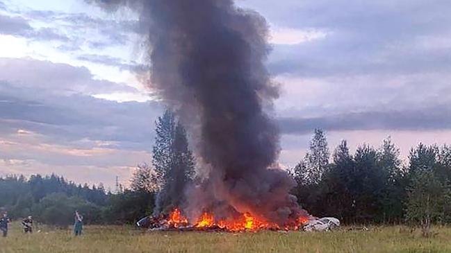 Yevgeny Prigozhin’s plane in flames after crashing near the village of Kuzhenkino, Tver region. Picture: AFP.