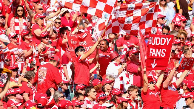 MELBOURNE, AUSTRALIA - SEPTEMBER 27: Swans fans show their support during the 2014 AFL Grand Final match between the Sydney Swans and the Hawthorn Hawks at Melbourne Cricket Ground on September 27, 2014 in Melbourne, Australia. (Photo by Quinn Rooney/Getty Images)