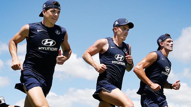 Carlton players run laps at training. Picture: Michael Klein