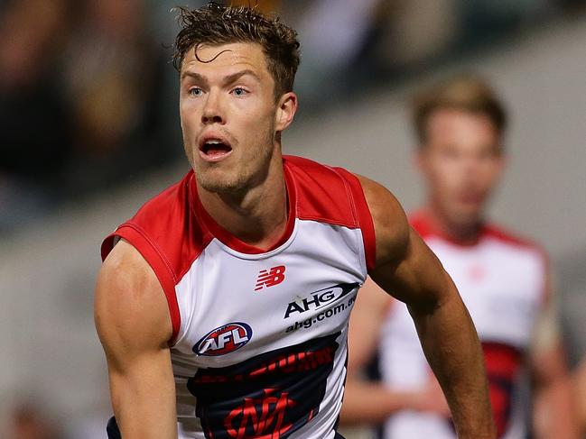 PERTH, WESTERN AUSTRALIA - JUNE 24:  Jake Melksham of the Demons looks to pass the ball during the round 14 AFL match between the West Coast Eagles and the Melbourne Demons at Domain Stadium on June 24, 2017 in Perth, Australia.  (Photo by Will Russell/AFL Media/Getty Images)