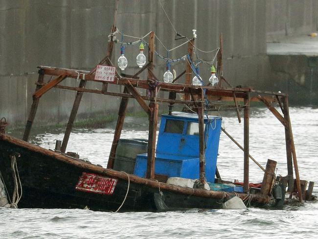 A wooden boat is seen at a nearby marina, in Yurihonjo, Akita prefecture. Picture: Hironori Asakawa/Kyodo News/AP