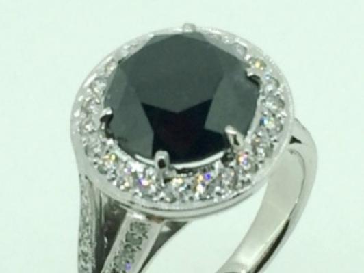 Halo design ring — 5.73ct black diamond centre — Stamped Imp $10,900