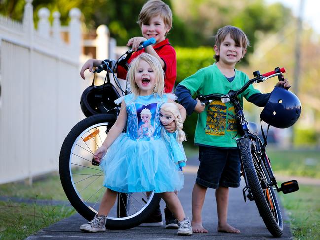 Jesse, Villiam and Nora with their new bikes, Elsa dress and Elsa doll. Picture: Nathan Edwards