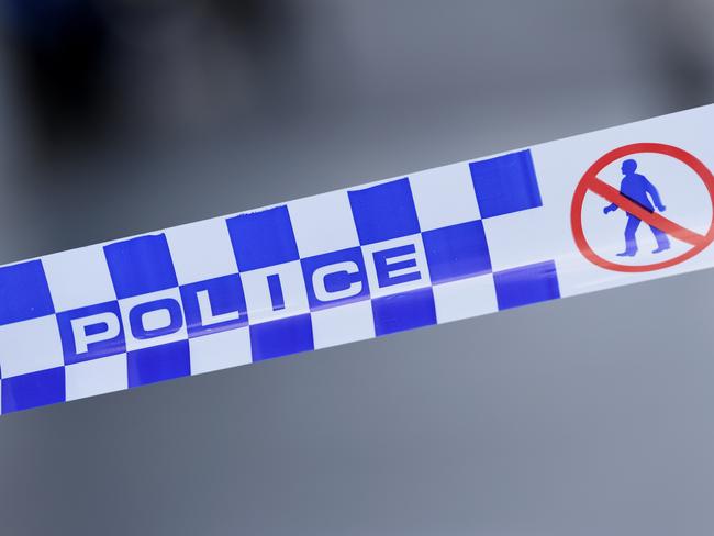 Generic image of police tape outside a crime scene on William Street in the Melbourne CBD on Wednesday, February 5, 2020. (AAP Image/James Ross) NO ARCHIVING